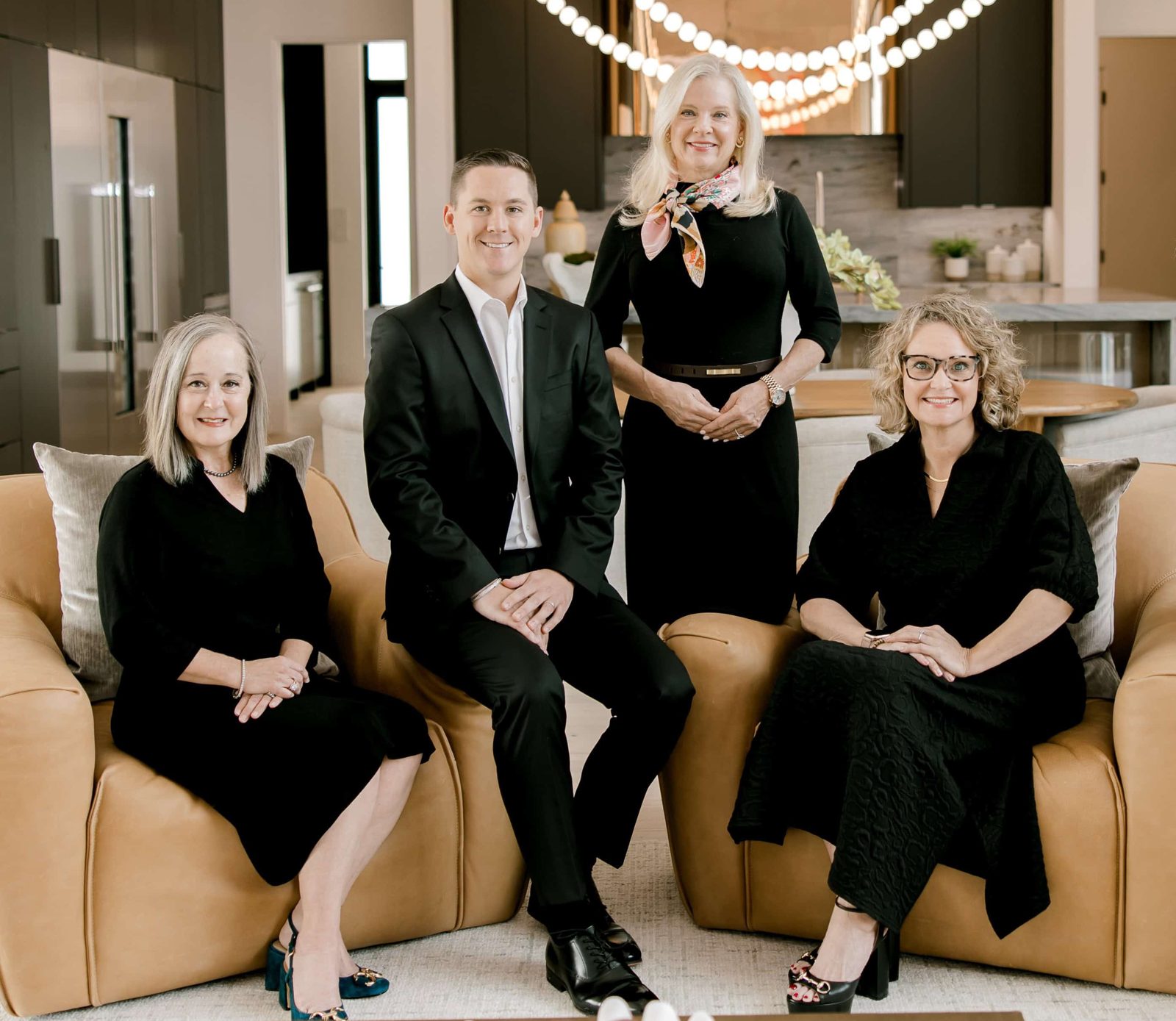 The Bailey Maberry Group together in a modern living room